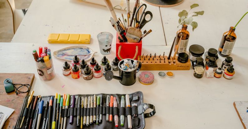 Inks - Calligraphy Tools on the White Wooden Table