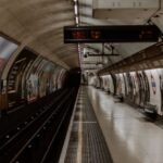 Hosting Platform - A subway station with a train and posters