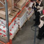 In-Store Distribution - Men Working in a Warehouse