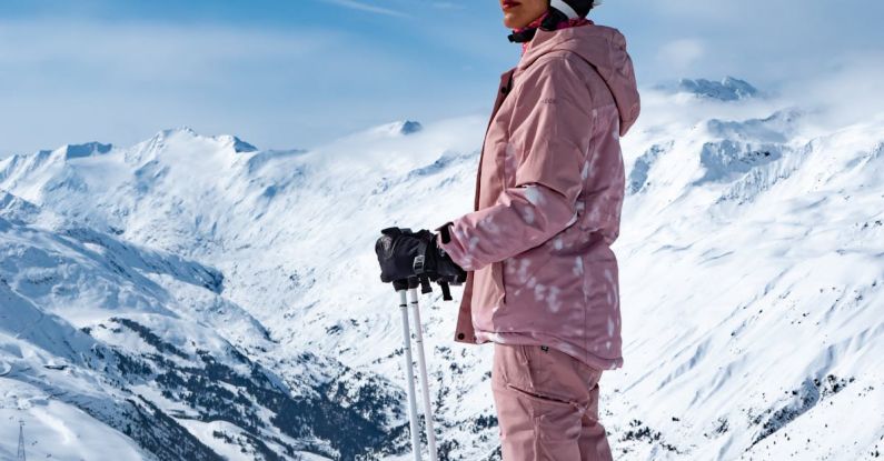Call-to-Action - A person in pink ski gear standing on a snowy slope